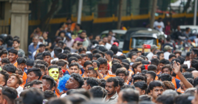 a large crowd of Indians shows Unemployment in India