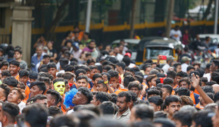 a large crowd of Indians shows Unemployment in India